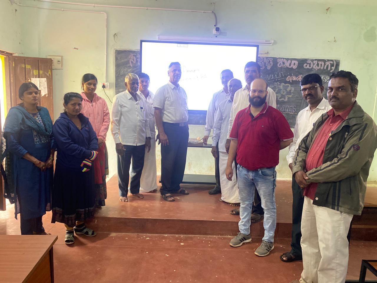 Trustees and staff with a new smart board